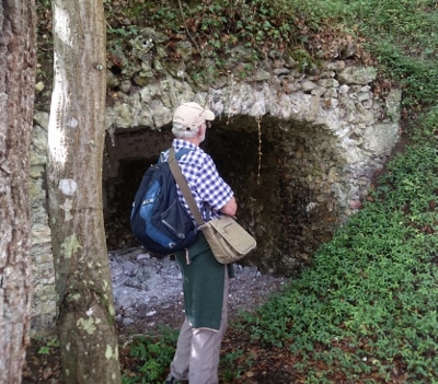 Thame Twinning member David Laver,  by a derelect grotto once luxuriously fitted out for a duchess and her guests to rest 