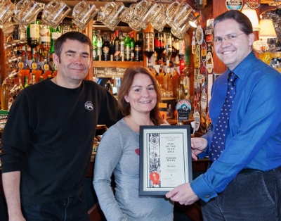 Peter & Trudi receive their certificate from Alexander Wright (Right) Photo by Frank Millar