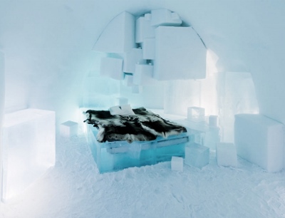 A bed of ice covered in reindeer skins, in the ice hotel - Courtesy of http://www.icehotel.com