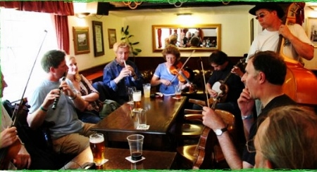 Musicians jam at The Three Horseshoes pub in Towersey during the 2013 festival