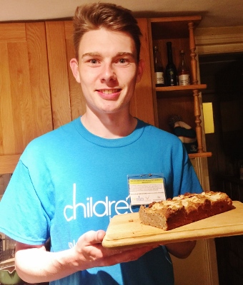 Olly Ross preparing for his charity cake stall tomorrow in Thame