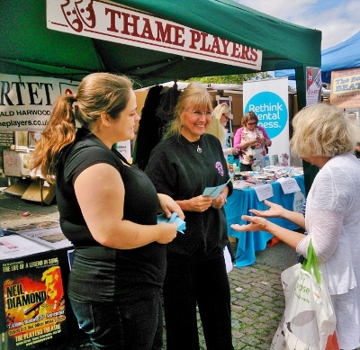 Members of Thame Players talk to supporters at Thame Market Fun Day 2014