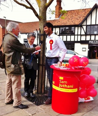 Labour Parliamentary candidate Sam Juthani is interviewed by the foreign press in Thame