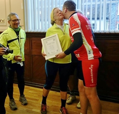 Elisabeth Charriere, from Montesson, receives a certificate and a kiss from Haddenham Hillbillie, Justin Shardlow