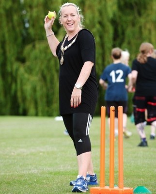 The Mayor of Thame, tries out her bowling at a recent 'Crick-Fit' session at Thame Cricket Club