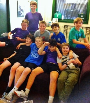 The squash tournement entrants relaxing after the competition 