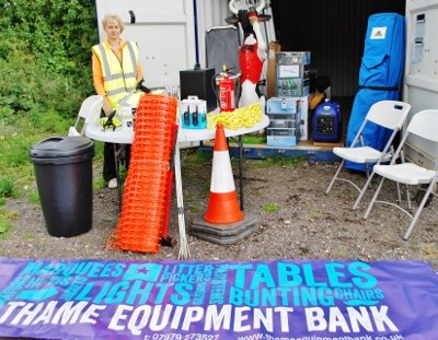 The current administrator of the Thame Equipment Bank, with just some of the items for hire