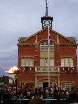 The flagpole in front of the town hall during the Beacon -lighting last Thursday, to celebrate The Queen's 90th birthday