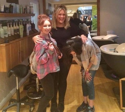 After the cut, with stylist Charlotte (centre)