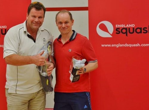 Simon Martin (left) receiving the winner's trophy