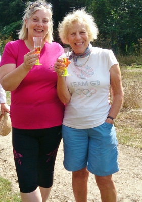 Linda Emery and Cynthia Jackson enjoy a glass of cider during the picnic break on the last day of their 3 day walk